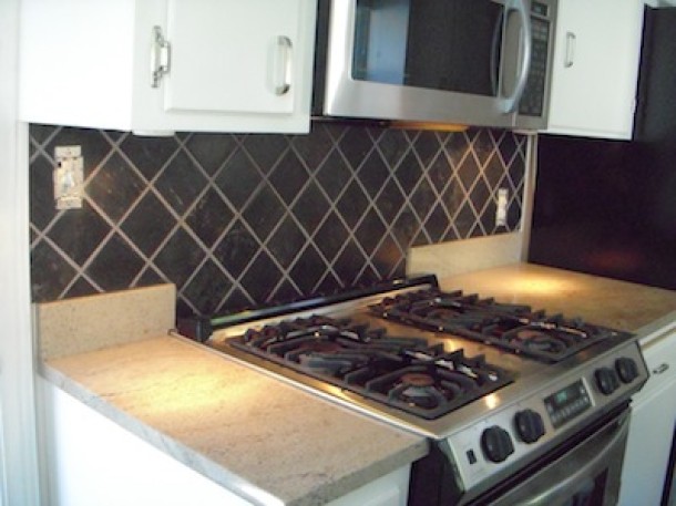 Black tile backsplash kitchen