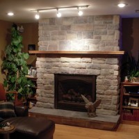 Basement stone fireplace
